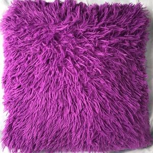 Fluffy purple & white pillow.
